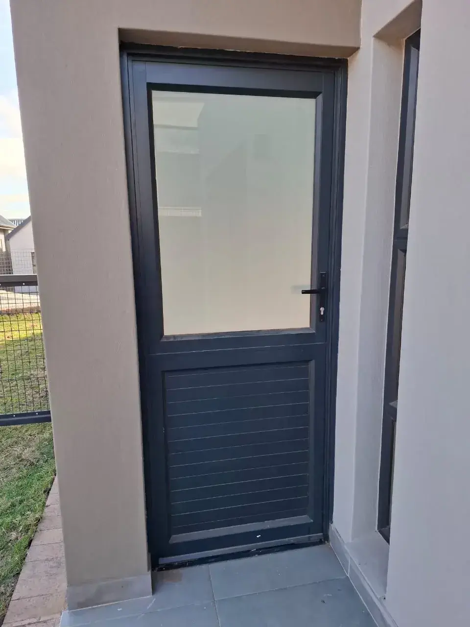 Large aluminium door installation
